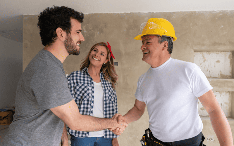 contractor and man shaking hands